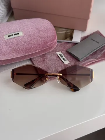 Miu Miu Brown/Gold MU 140AV 09X-101 61/17/128