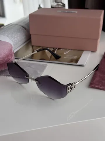 Miu Miu Black/Silver MU 140AV AAV-101 61/17/128